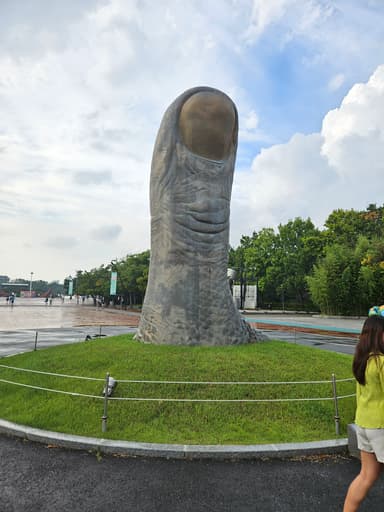 親指
