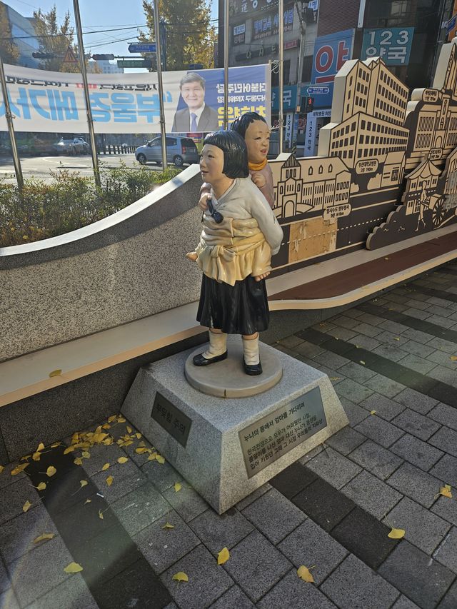 토성駅前の少女